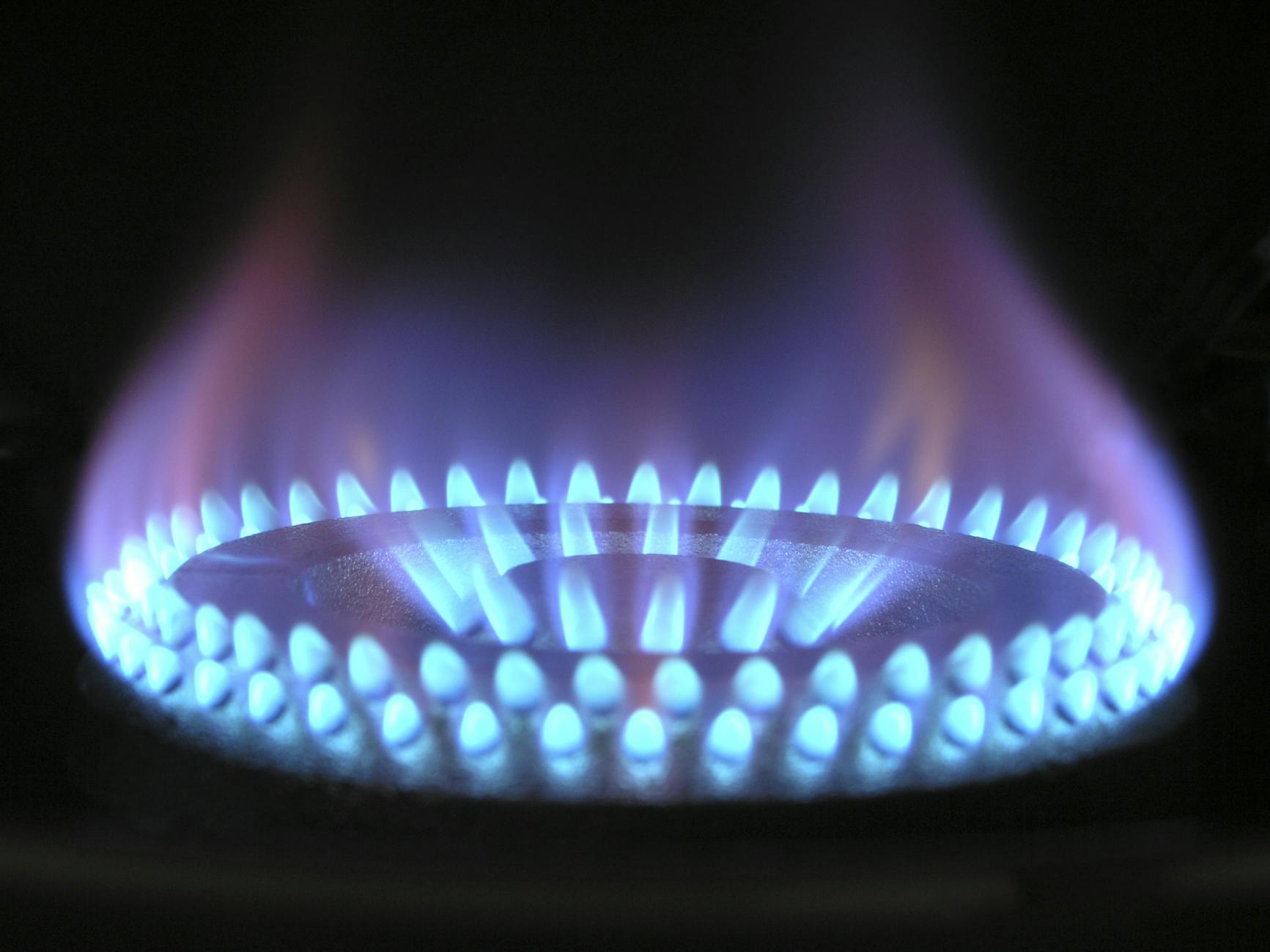 Clean blue gas flame — the sign of a properly serviced heater